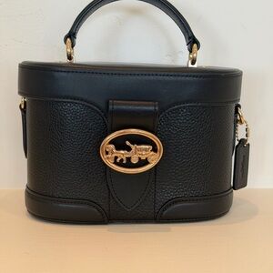 Coach Black Mini Bag with Gold Accents